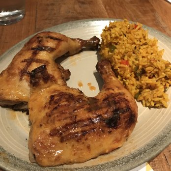 Nando's Peri-Peri - Two 1/4 leg and a side of Portuguese rice - Chicken Shop Near Me - Chicago, Illinois Nando's Peri-Peri - Two 1/4 leg and a side of Portuguese rice - Chicken Shop Near Me - Chicago, Illinois
