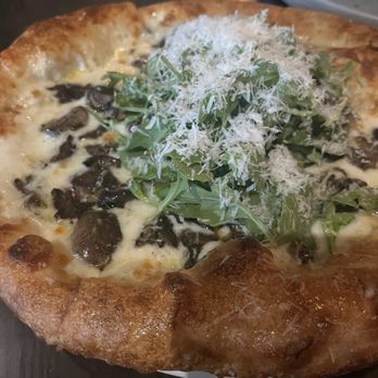 Passero - Mushroom pizza with arugula - Italian Near Me - Arlington Heights, Illinois Passero - Mushroom pizza with arugula - Italian Near Me - Arlington Heights, Illinois