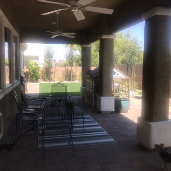Distinctive Exteriors - Besides the two teal pots and covered patio visible in this photo, everything else is new installation. - Landscape Architects or Designers Near Me - Las Vegas, Nevada