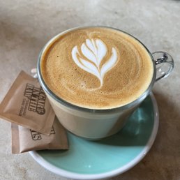 a cup of coffee on a saucer a cup of coffee on a saucer