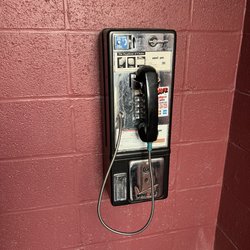 Magooby's Joke House - Pay phone outside the place. Didn't work.