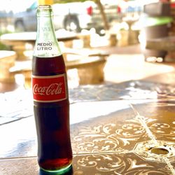 Los Arbolitos - Outside in the patio with an ice cold Coke.