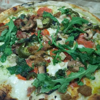 Blaze Pizza - Build your own.  Topped with fresh arugula and pesto drizzle - Salad Near Me - Tracy, California