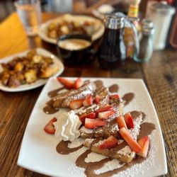 Toast Coffeehouse - The Krispy Nutella French Toast with side of home fries and vanilla latte