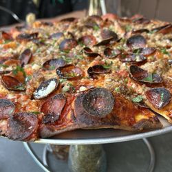 Pizzalina - Tavern style pizza with pepperoni and sausage