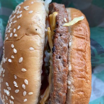 Burger King - a hamburger with cheese and onions - Burgers Near Me - Jackson, Mississippi