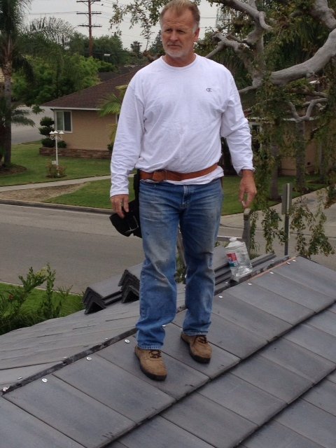 Slide of RC Roofing Co