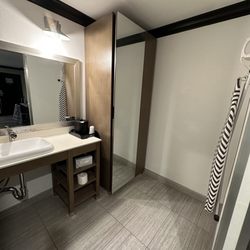 OC Hotel - Closet with ironing board and iron
