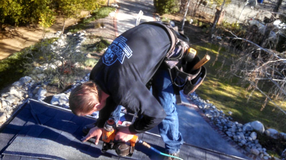 Slide of Wolfe Roofing Company