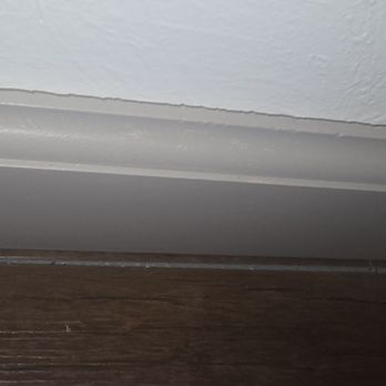 Empire Today - Floor is separating with baseboards - Flooring Near Me