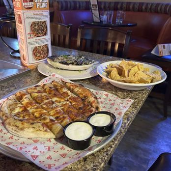 Farrelli's Pizza - Farrelli's Fire Stix Bread Stix and Garlic Gorgonzola Artichoke Dip Creamy spinach & artichoke - Pizza Near Me - Puyallup, Washington Farrelli's Pizza - Farrelli's Fire Stix Bread Stix and Garlic Gorgonzola Artichoke Dip Creamy spinach & artichoke - Pizza Near Me - Puyallup, Washington