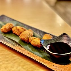 Okinawa Ramen & Hibachi - Fried Oysters comes five to an order. Oysters are fabulous. Did not like the sauce, didn't need it as I use hot chili oil instead. YUM! :)..