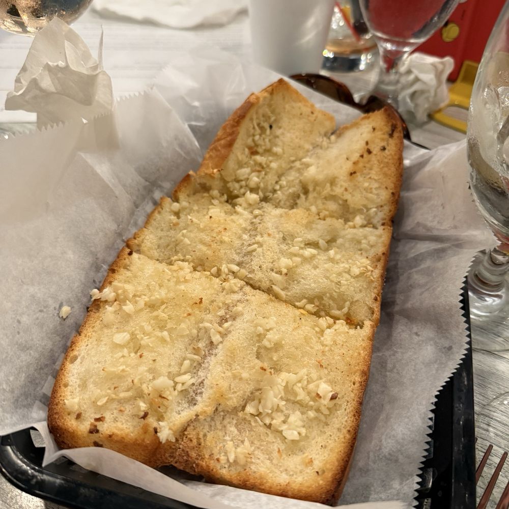 TJ's Italian Cafe - Garlic bread --- yum - Italian Near Me - Indian Rocks Beach, Florida TJ's Italian Cafe - Garlic bread --- yum - Italian Near Me - Indian Rocks Beach, Florida