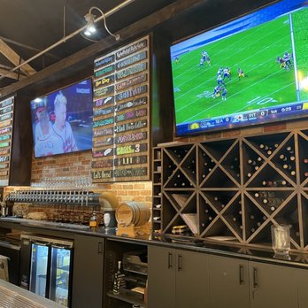 Running Rooster - Bar area - 3 large TVs - American Near Me - Hollister, California Running Rooster - Bar area - 3 large TVs - American Near Me - Hollister, California