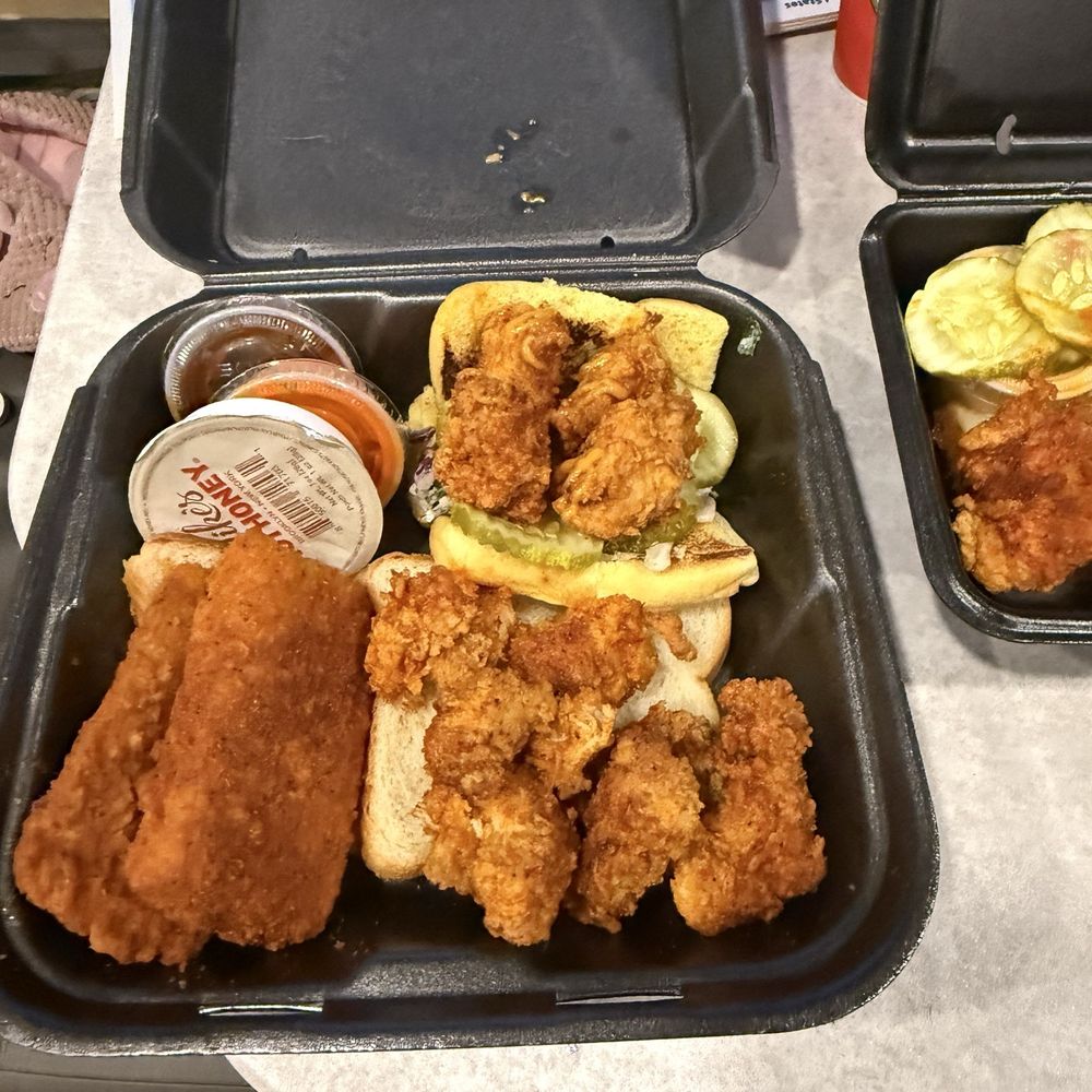 Dave's Hot Chicken - The chicken bites in this picture were supposed to be two chicken strips.... four pieces of chicken for the slider, but only two buns? - Chicken Shop Near Me - Montgomery, Alabama Dave's Hot Chicken - The chicken bites in this picture were supposed to be two chicken strips.... four pieces of chicken for the slider, but only two buns? - Chicken Shop Near Me - Montgomery, Alabama