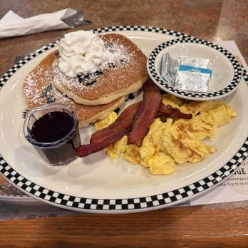 Black Bear Diner Moreno Valley - Blueberry Pancake Combo with Eggs & 2 Slices of Thick-Cut Smoked Bacon - Diners Near Me - Moreno Valley, California Black Bear Diner Moreno Valley - Blueberry Pancake Combo with Eggs & 2 Slices of Thick-Cut Smoked Bacon - Diners Near Me - Moreno Valley, California