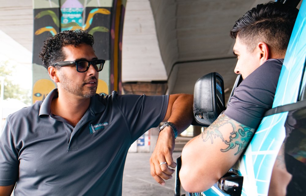 Slide of Two Brothers Roofing