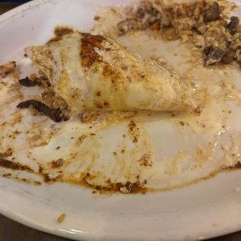 LOS GENERALES MEXICAN RESTAURANT - Hot and spicy burrito. Already bitten into. - Mexican Near Me - Davis, Oklahoma LOS GENERALES MEXICAN RESTAURANT - Hot and spicy burrito. Already bitten into. - Mexican Near Me - Davis, Oklahoma