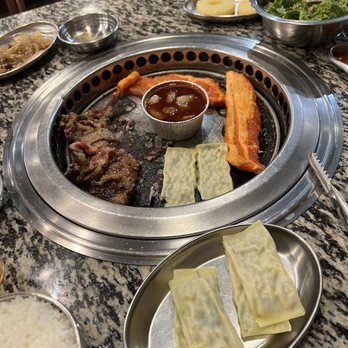 Let's Meat Kbbq - chili shrimp boiling in the middle, saffron pork belly (yum), disgusting dumplings - Korean Near Me - Charlotte, North Carolina Let's Meat Kbbq - chili shrimp boiling in the middle, saffron pork belly (yum), disgusting dumplings - Korean Near Me - Charlotte, North Carolina