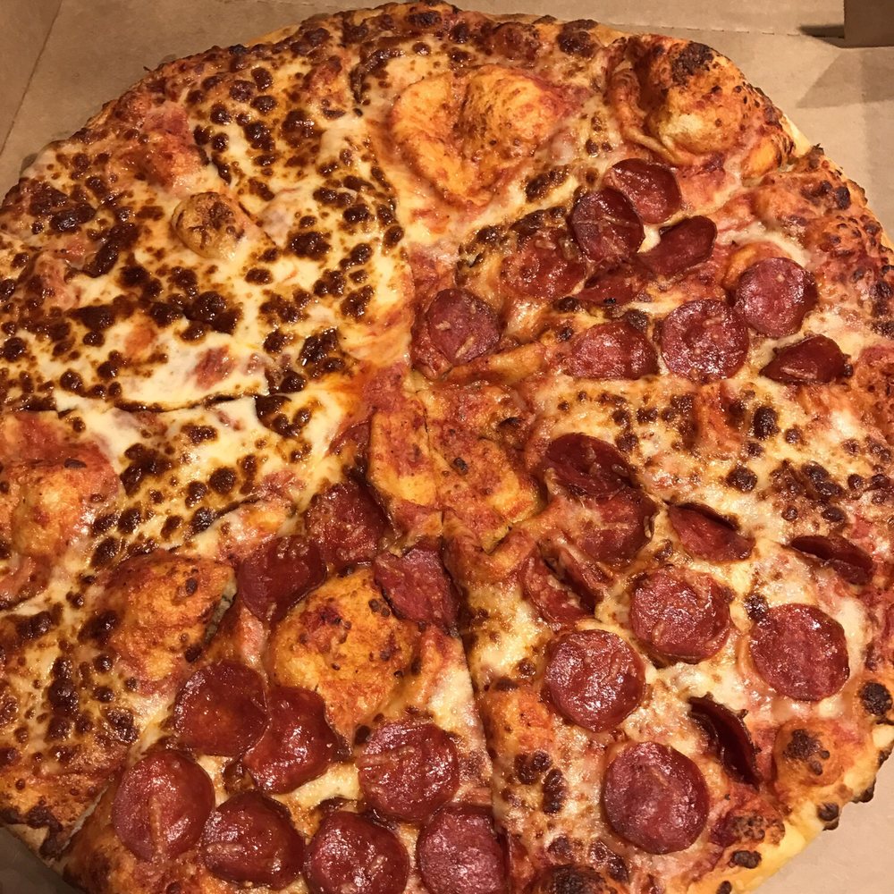 a pepperoni pizza in a box