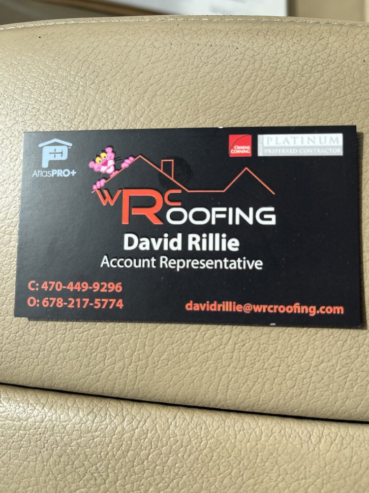 Slide of Whitaker roofing company