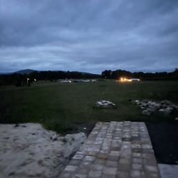 Blue Ridge Mountain Maze - View of the mountains & corn maize check in area from tiki bar