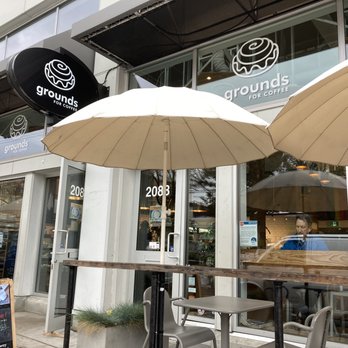 Grounds For Coffee - tables and umbrellas outside - Coffee & Tea Near Me - Vancouver, British Columbia Grounds For Coffee - tables and umbrellas outside - Coffee & Tea Near Me - Vancouver, British Columbia