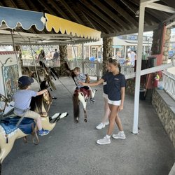 Watch Hill Merry Go Round & Beach - Grabbing a ring!
