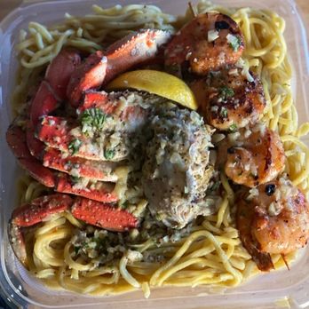 Chef Smelly's - 1/2 Creole Dungeness Crab Fries Half Dungeness Crab, Garlic Noodles and Blackened Prawns - Cajun/Creole Near Me - Oakland, California Chef Smelly's - 1/2 Creole Dungeness Crab Fries Half Dungeness Crab, Garlic Noodles and Blackened Prawns - Cajun/Creole Near Me - Oakland, California