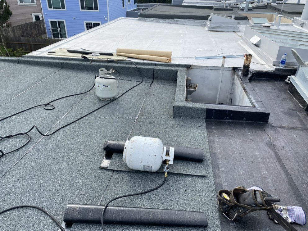 Slide of Miranda's Roofing Partnership