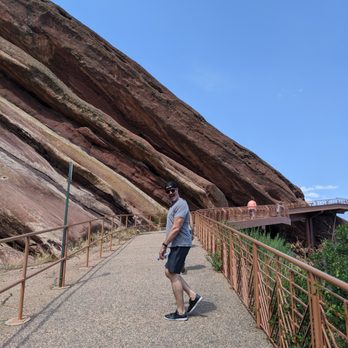 Red Rocks Amphitheatre - Walking up the LONG and steep ramp to the amphitheater from one of the parking lots. - Music Venues Near Me - Morrison, Colorado Red Rocks Amphitheatre - Walking up the LONG and steep ramp to the amphitheater from one of the parking lots. - Music Venues Near Me - Morrison, Colorado