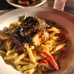Euphoria Restaurant & Lounge - Elmont pasta with Guinness jerk chicken