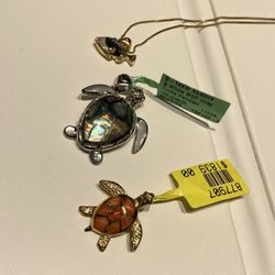 Hawaiian State fish and two turtle pendants with diamonds and 14 K gold.