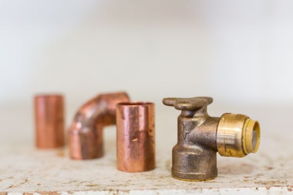 Vertec Plumbing, Drains & Sprinklers Logo