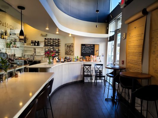 Photo of Pizzeria Omaggio - Charlotte, NC, US. interior counter with provisions