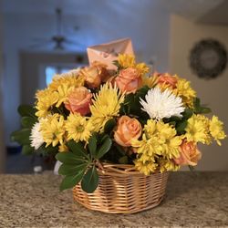 Texas Elite Floral and Garden Company - Floral arrangement with basket