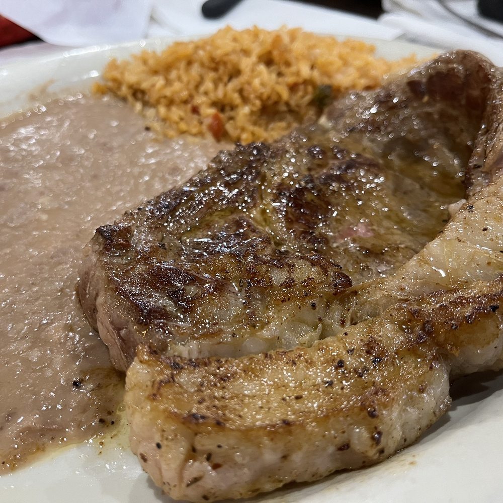 Steak House - Ribeye 12 oz rice and beans with a slice of white bread - Mexican Near Me - Zapata, Texas Steak House - Ribeye 12 oz rice and beans with a slice of white bread - Mexican Near Me - Zapata, Texas
