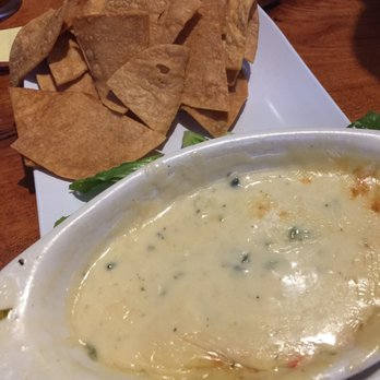 Sauced Wing Bar - Chips and queso minus pico topping - Chicken Wings Near Me - Boerne, Texas Sauced Wing Bar - Chips and queso minus pico topping - Chicken Wings Near Me - Boerne, Texas