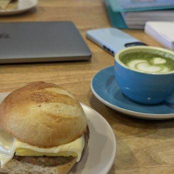 Elevation Coffee Roasters - Sausage sandwhich with hot matcha - Coffee Roasteries Near Me - Tampa Bay, Florida