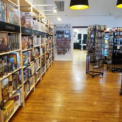 Moonshot Games - Well organized shelves of gaming supplies
