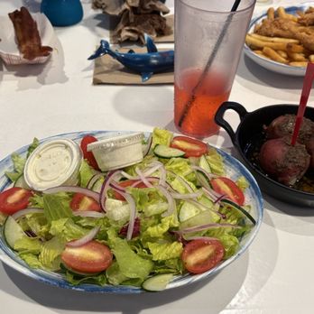 The Hangout - HANGOUT HOUSE SALAD OLD BAY BUTTER POTATOES - Burgers Near Me - Myrtle Beach, South Carolina The Hangout - HANGOUT HOUSE SALAD OLD BAY BUTTER POTATOES - Burgers Near Me - Myrtle Beach, South Carolina