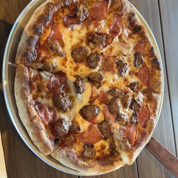 Hideaway Pizza - Sausage and Canadian bacon pizza - Pizza Near Me - Plano, Texas