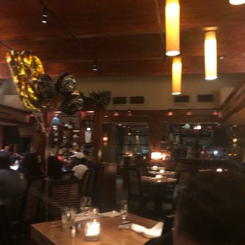Seasons 52 - The main dining area, someone's having a large birthday celebration! - New American Near Me - Jacksonville, Florida Seasons 52 - The main dining area, someone's having a large birthday celebration! - New American Near Me - Jacksonville, Florida