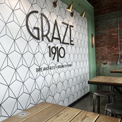 Graze 1910 - Sign by seating and window
