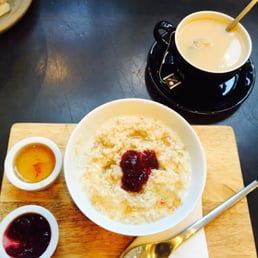 My porridge with lingonberry jam and honey. And cup o' tea.
