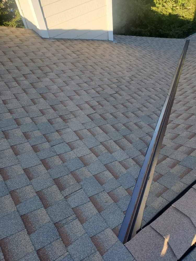 Slide of Ken Cooper Roofing and Gutter Systems, Inc