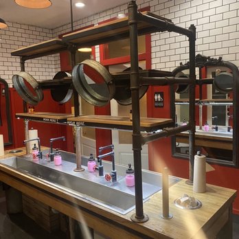 Whiskey Cake Kitchen & Bar - Uniquely styled restroom - New American Near Me - Katy, Texas Whiskey Cake Kitchen & Bar - Uniquely styled restroom - New American Near Me - Katy, Texas