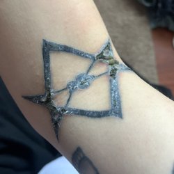 Fine Line Design - I have NEVER ONCE had a tattoo look like this after being done, infected and irritated. Done by Jeremy (the owner). Never going back.