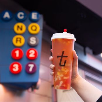 Tbaar Park Slope - a hand holding a cup of iced tea - Bubble Tea Near Me - Brooklyn, New York Tbaar Park Slope - a hand holding a cup of iced tea - Bubble Tea Near Me - Brooklyn, New York
