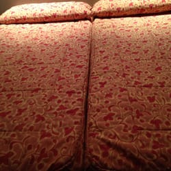Villa de Barajas - My bed, which the mattress fell off of when I got the courage to sit on it. Not for the feint of heart.